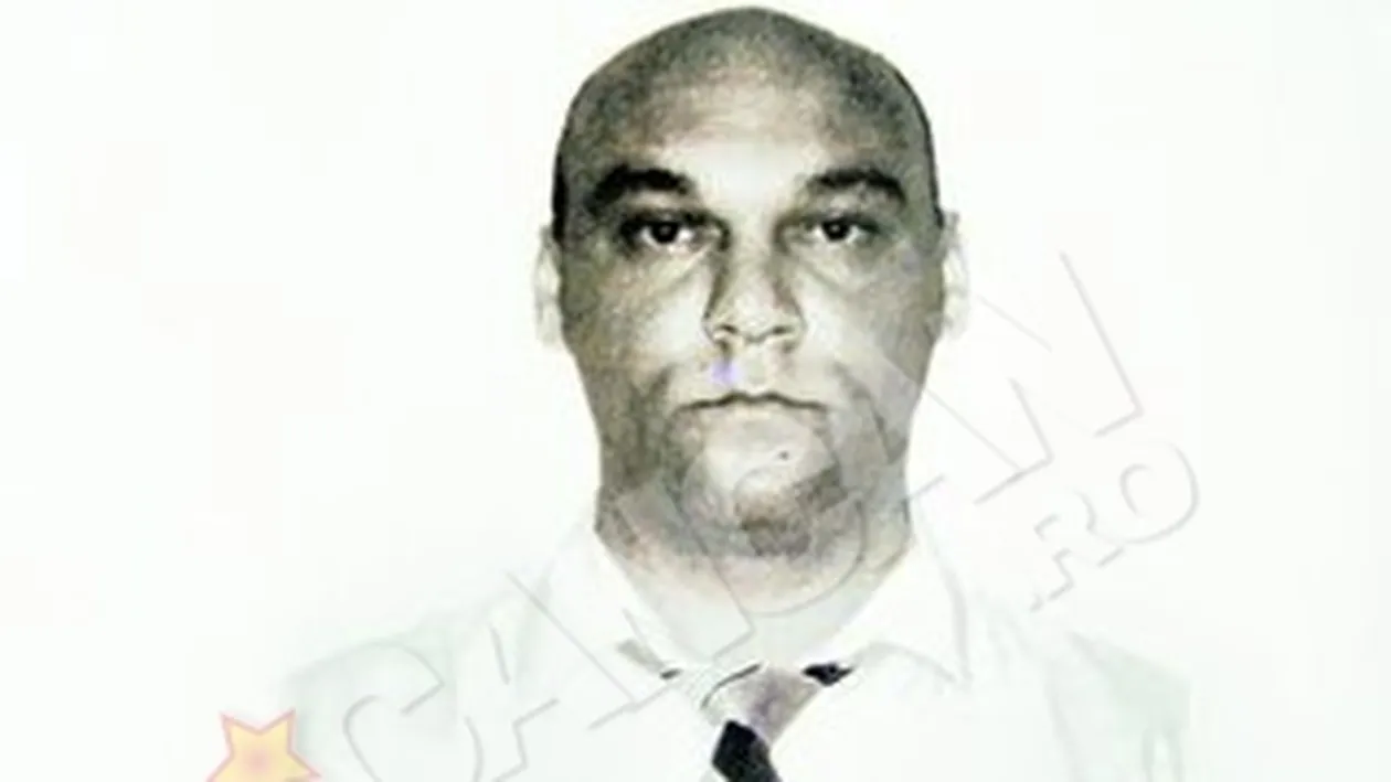 Un politist si-a executat parintii