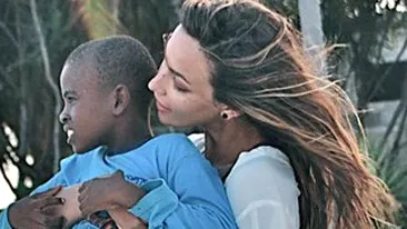 Dupa ce s-a facut blonda pentru o sedinta foto, Madalina Ghenea a revenit la saten! Vezi cum arata balaie