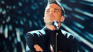 Robbie Williams a primit un ULTIMATUM din partea colegilor de trupa! Ce decizie importanta trebuie sa ia