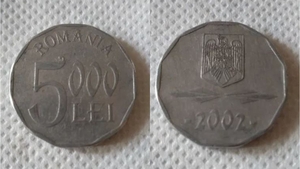 Tu mai ai deții așa ceva? Prețul ireal la care se vinde o monedă de 5.000 de lei din anul 2002, acum, la 21 de ani diferență