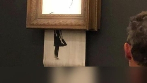 Un tablou Bansky s-a autodistrus imediat ce a fost vândut cu un milion de lire sterline