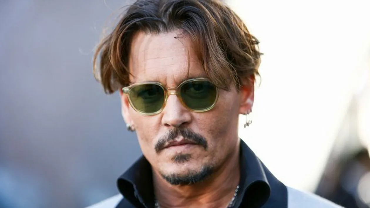 Johnny Depp şi-a dat în judecată fosta soţie şi îi cere daune de 50 de milioane de dolari