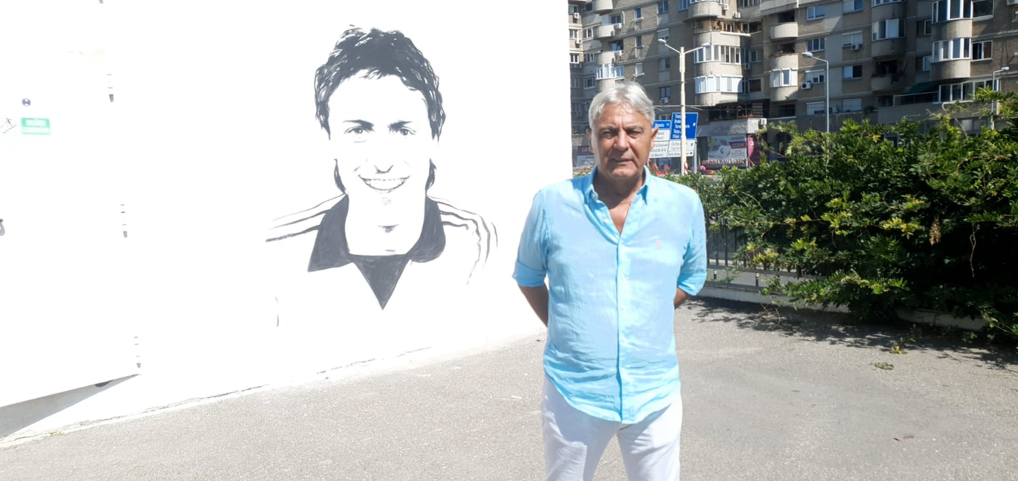 Un craiovean talentat! După ce a pictat chipul lui Ilie Balaci, acum l-a pictat și pe Sorin Cârțu pe unul dintre zidurile Craiovei. FOTO