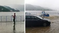 VIDEO incredibil! Un bărbat pescuiește pe faleza din Orșova, după ce o ploaie torențială a inundat toată zona
