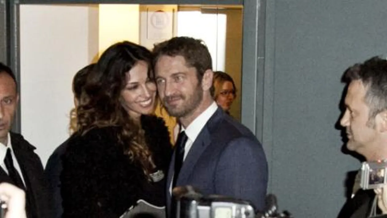In timp ce Madalina Ghenea se ruga alaturi de maici la Voronet, Gerard Butler petrecea impreuna cu Katy Perry, fosta lui iubita!