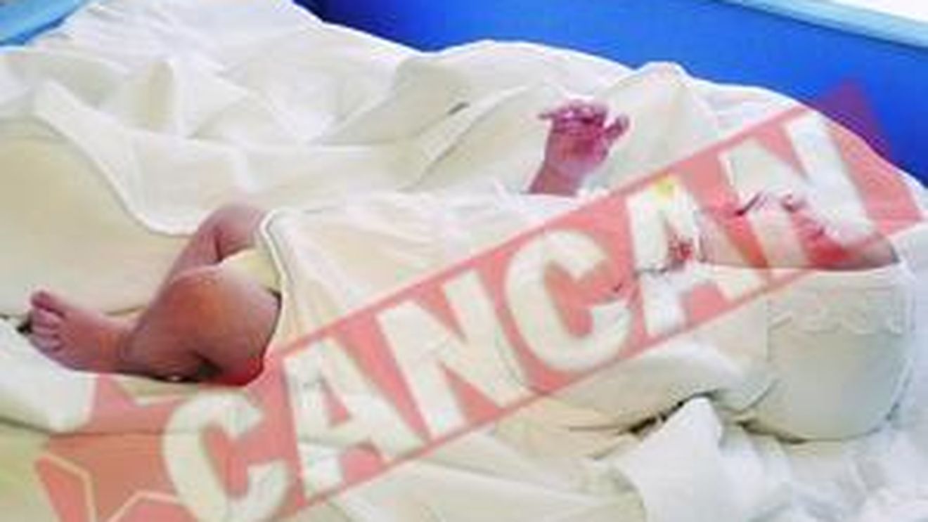 Vrea sa infieze un bebelus abandonat in scara Blocului