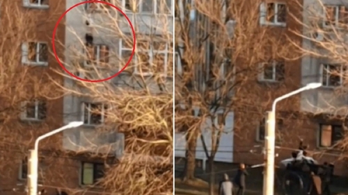 VIDEO! Momentul în care tânăra din Craiova se aruncă de la etaj și este salvată cu cearșaful de vecini