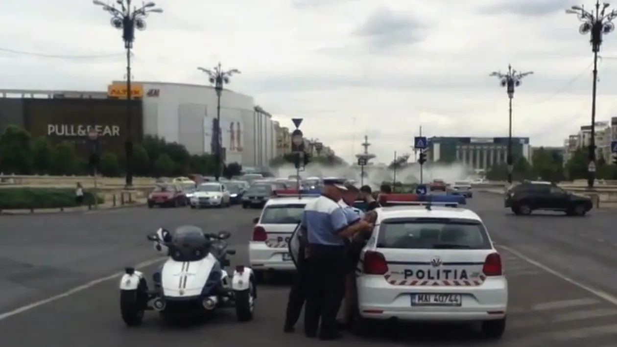 Imagini de infarct în centrul Capitalei. O femeie a fost încătuşată de 12 poliţişti, dintr-un motiv incredibil