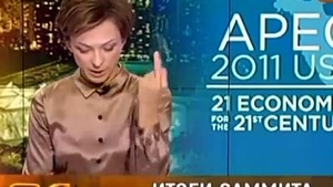 VIDEO O prezentatoare TV din Rusia a facut un gest obscen la adresa lui Obama! Vezi despre ce semn este vorba!