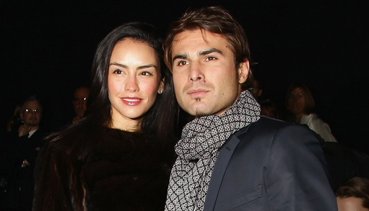 MILAN, ITALY - JANUARY 15: L-R Consuelo Matos Gomez and Adrian Mutu attend  Roberto Cavalli Fashion Show as part of Milan Fashion Week Menswear A/W 2011on January 15, 2011 in Milan, Italy.  (Photo by Vittorio Zunino Celotto/Getty Images)