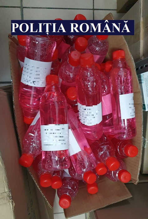 Polițiștii i-au prins! Ce era, de fapt, în sticlele de spirt pe care le vindea o farmacie din Constanța