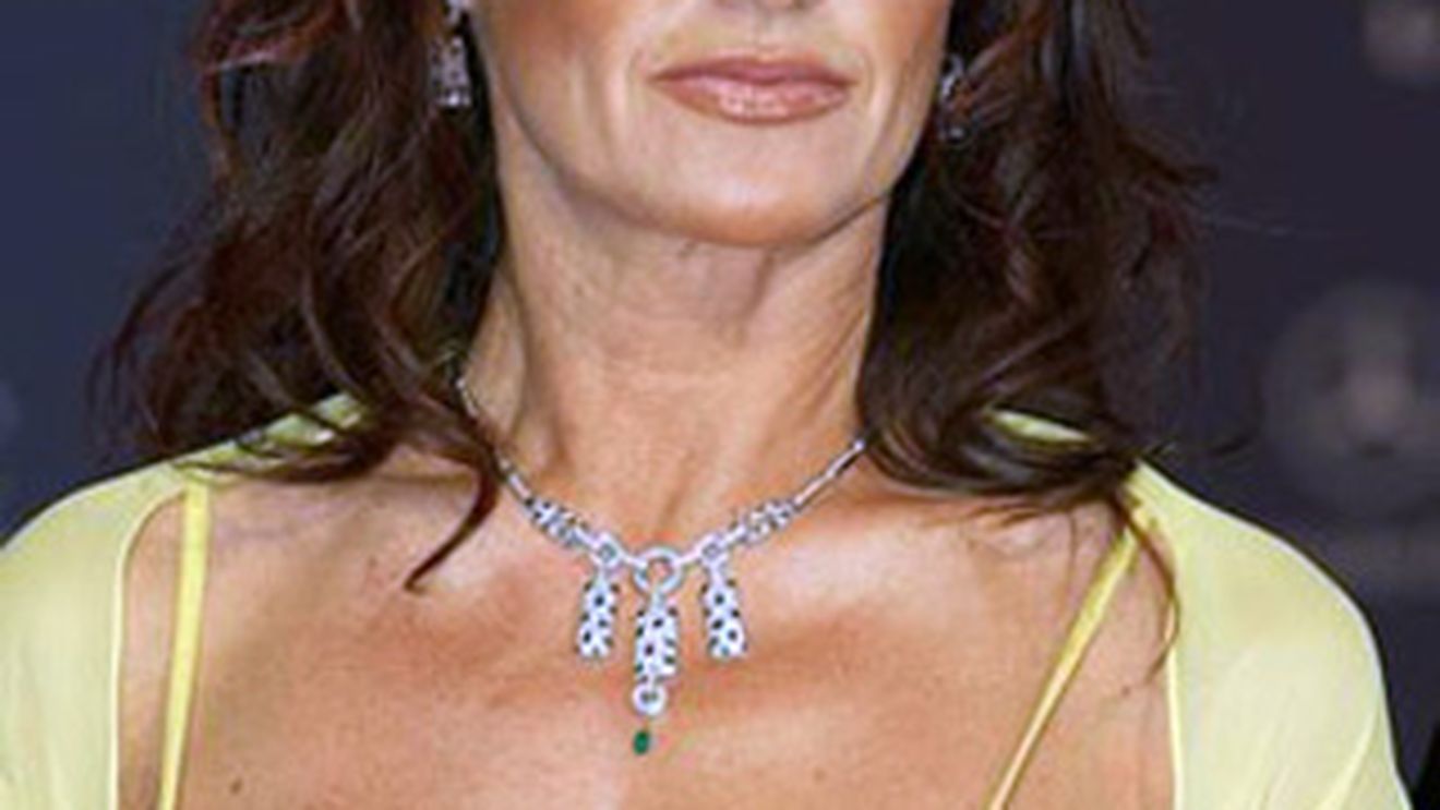 Nadia Comaneci poarta astazi torta olimpica