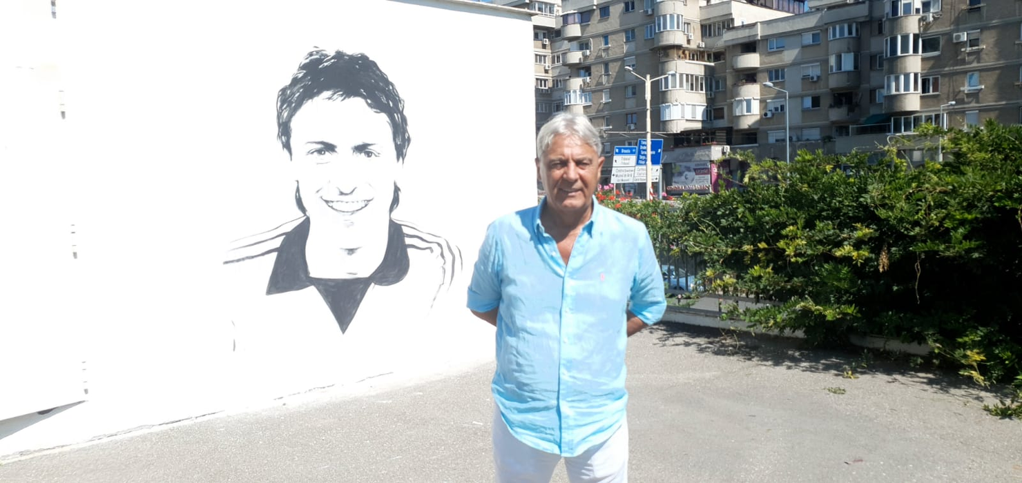 Un craiovean talentat! După ce a pictat chipul lui Ilie Balaci, acum l-a pictat și pe Sorin Cârțu pe unul dintre zidurile Craiovei. FOTO