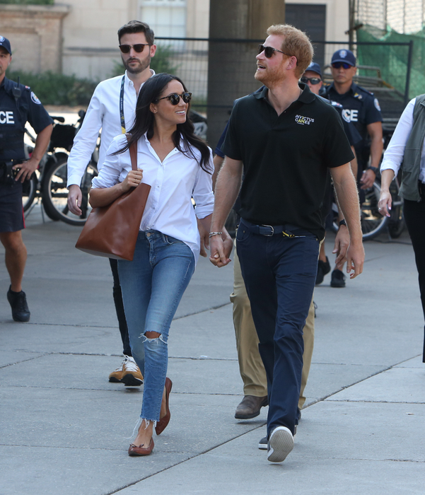 Prince Harry and Meghan Markle attend the Tennis together at the Invictus Games in Toronto, Canada. Pictured: Prince Harry and Meghan MarkleRef: SPL1586512  250917  Picture by: Splash NewsSplash News and PicturesLos Angeles:310-821-2666New York:212-619-2666London:870-934-2666photodesk@splashnews.com