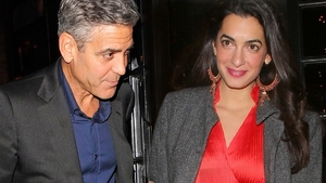 George si Amal Clooney vor sa adopte un copil dintr-o tara afectata de razboi