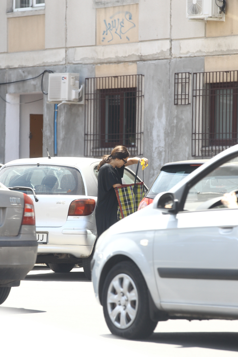 Singurul accesoriu de culoare  pe care l-a ales a fost geanta