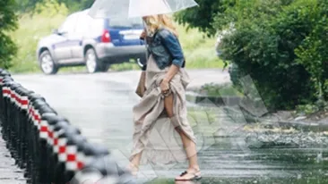 Simona Gherghe si-a aratat picioarele, in toata splendoarea, pe strada! I-a venit ploaia de hac!